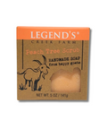 Handmade soap from happy goats in a 'Legend's Creek Farm' packaging on a white background
